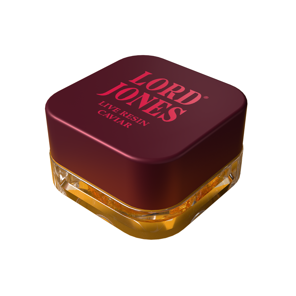 Orange Velvet Live Resin Caviar concentrate in a glass jar surrounded by bright citrus tones, representing premium cannabis extract available at Grassroots Cannabis in Windsor, Ontario.